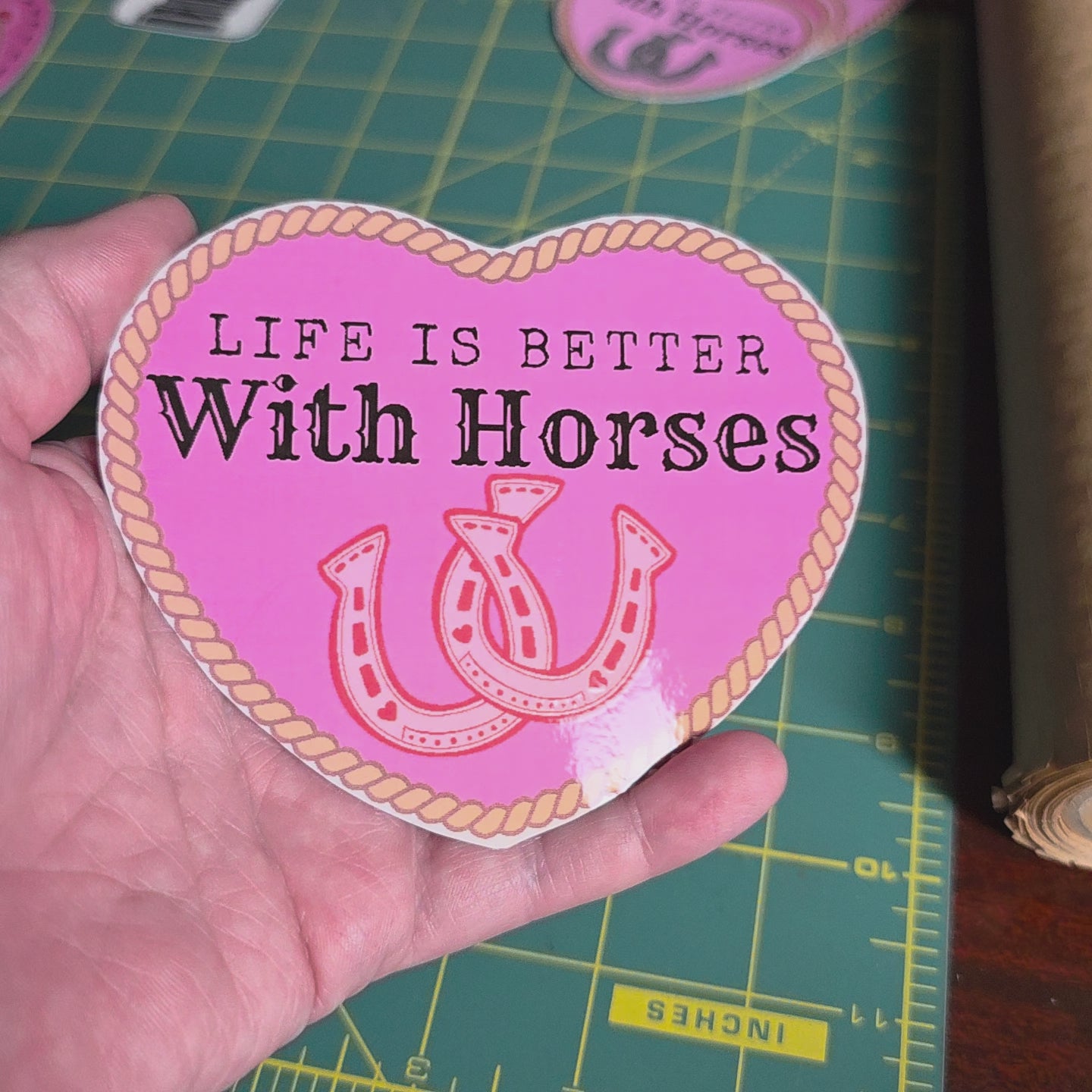 "Life is better with horses" 4 inch hot pink heart sticker.