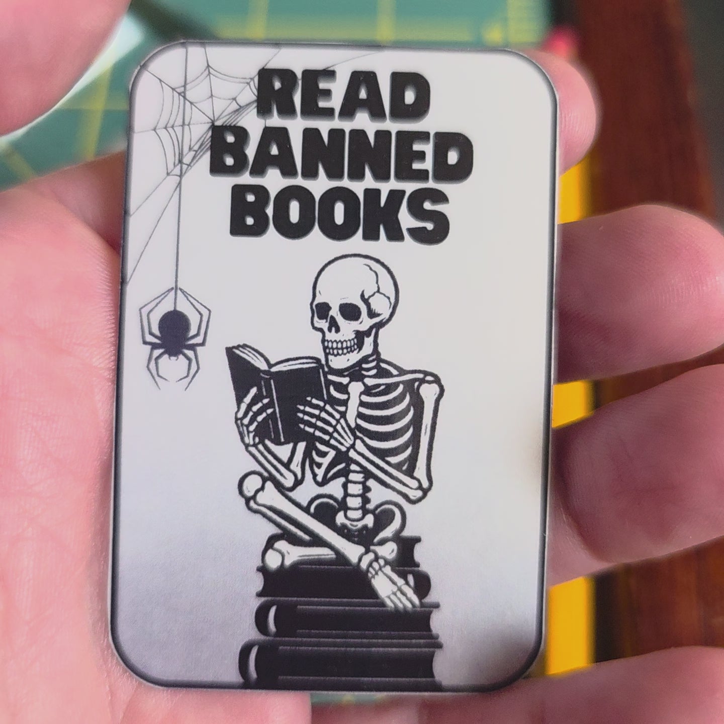 Skeleton and books "Read Banned Books"small sticker.