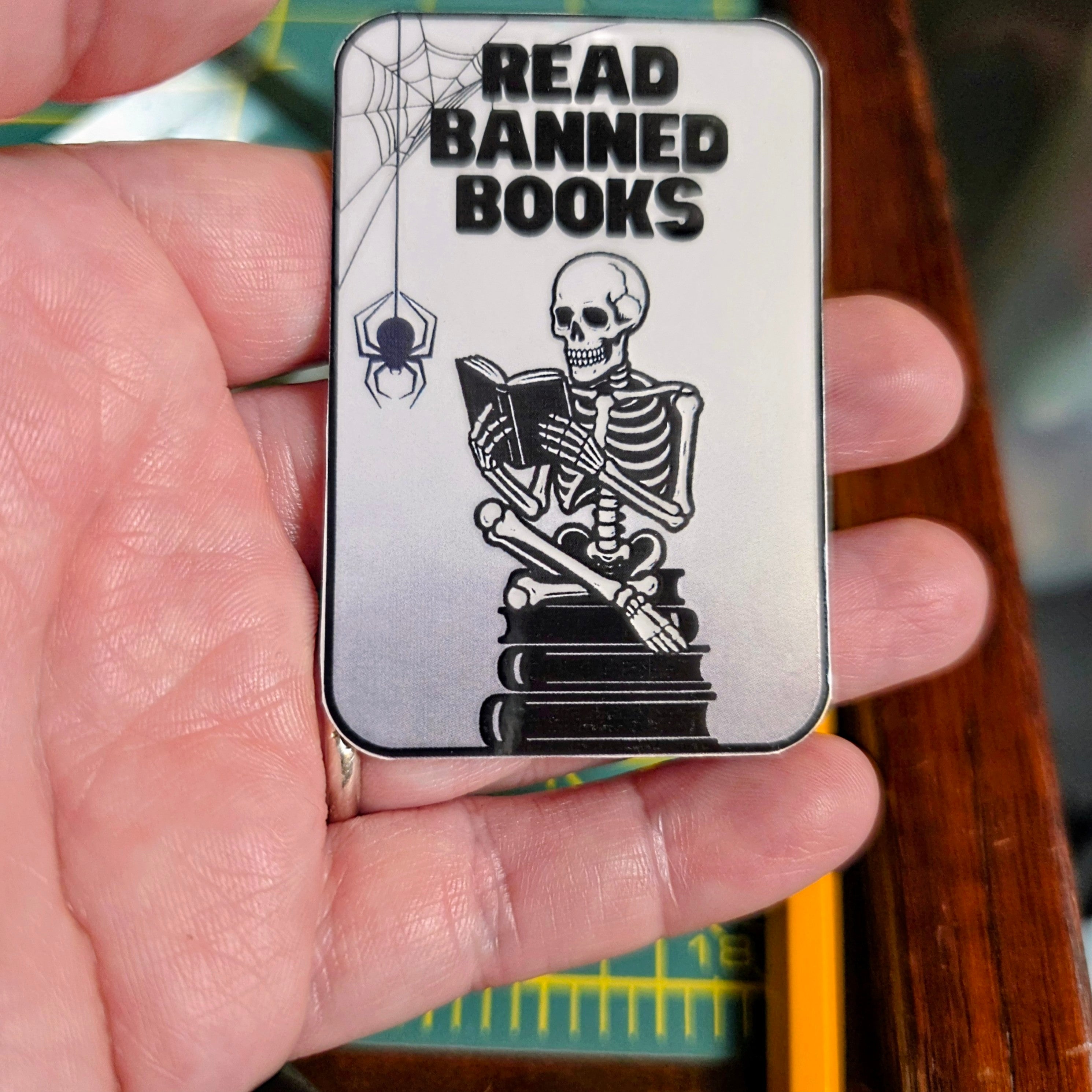 Skeleton and books "Read Banned Books"small sticker.