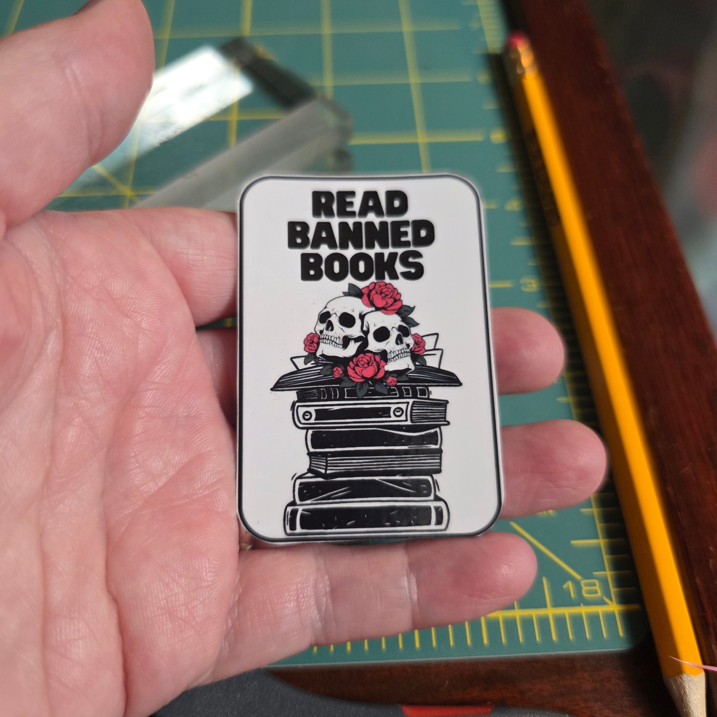 Skull and books "Read Banned Books"small sticker.