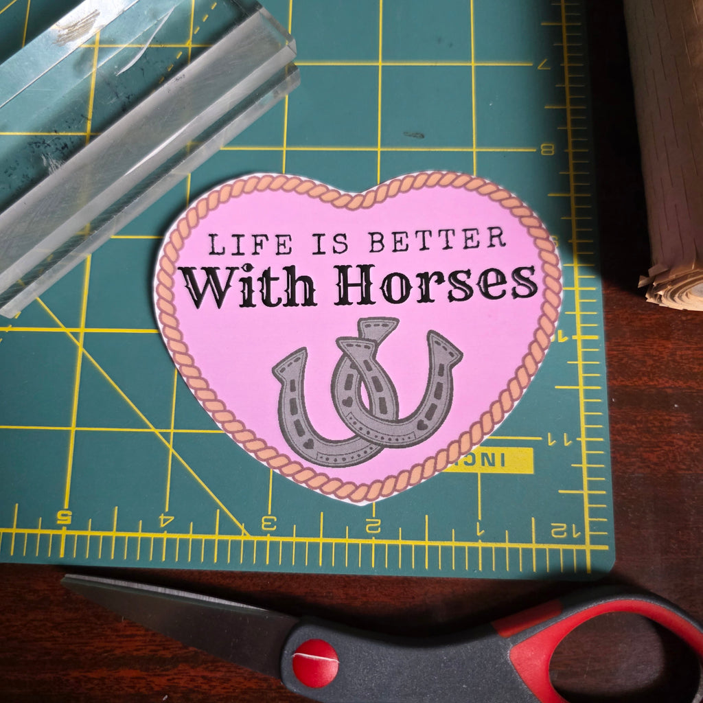 "Life is better with Horses" 4 inch light pink heart sticker.