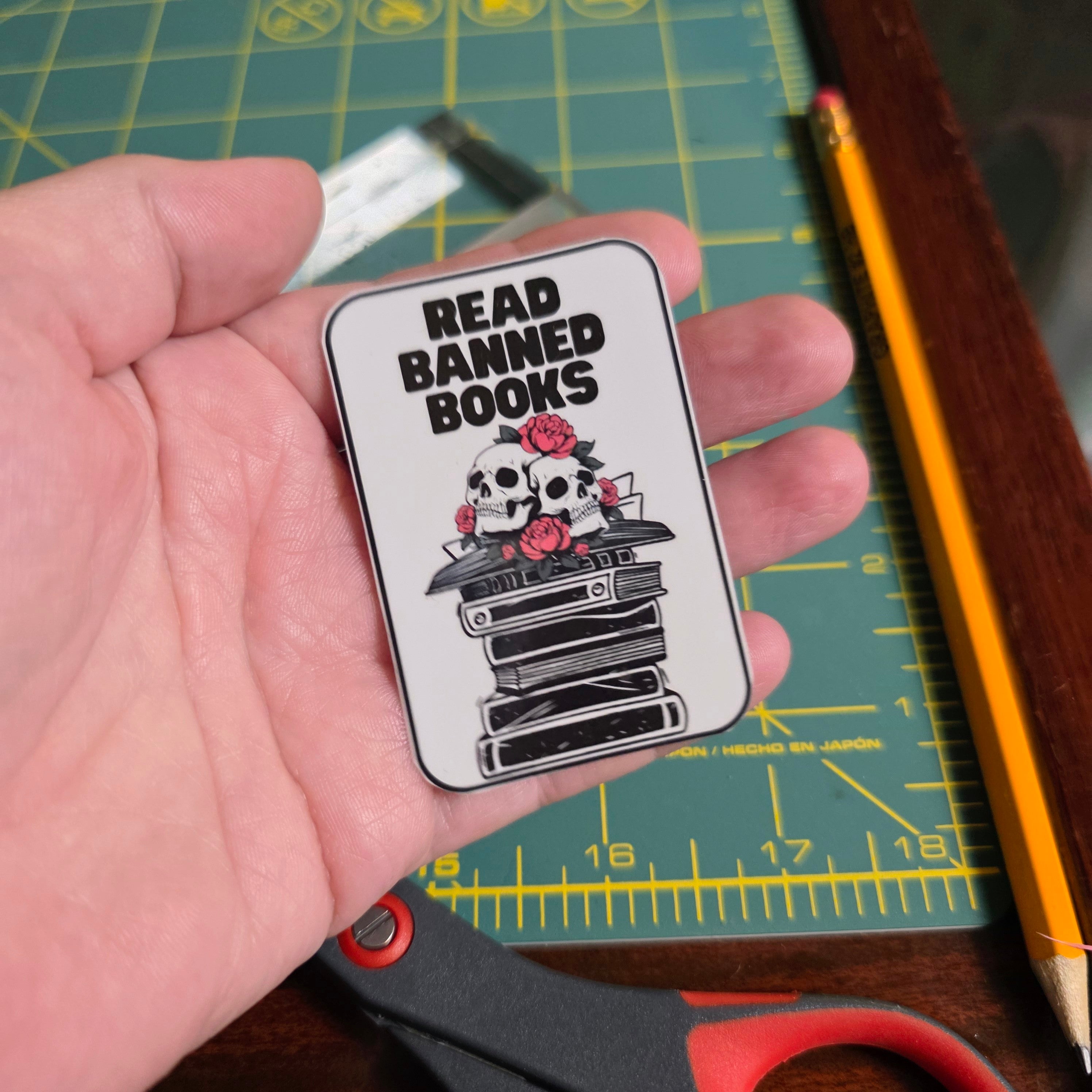 Skull and books "Read Banned Books"small sticker.