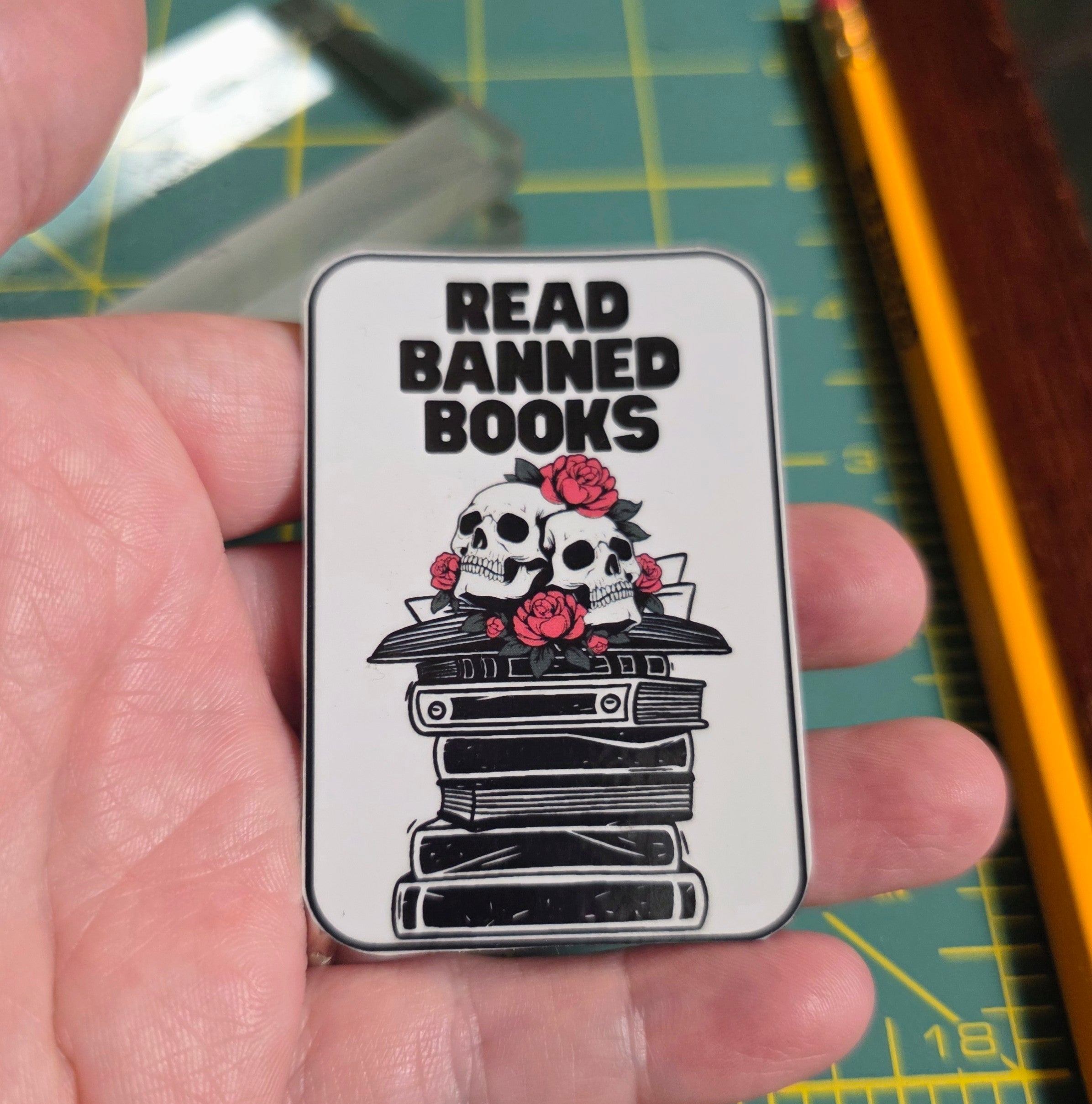 Skull and books "Read Banned Books"small sticker.